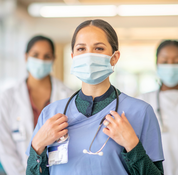 Doctor and nurse reviewing patient chart in a clinical setting